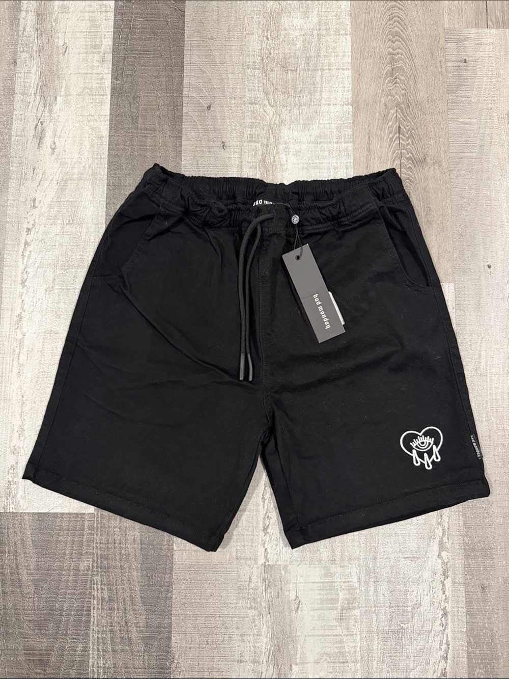 Men's Black Cargo-Style Drawstring Shorts with Bad Monday Crying Heart Logo